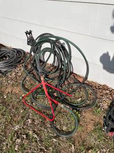 lot 2015 image: Wobbler sprinkler on stand with hose