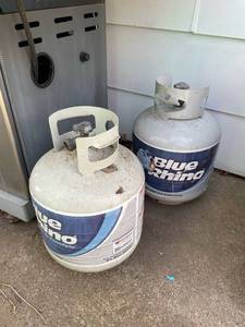lot 2028 image: One full and one half full propane tanks