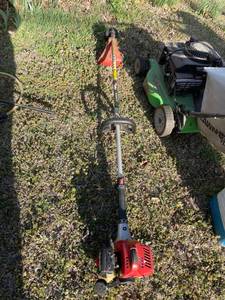 lot 2036 image: Red Max gas powered weed eater