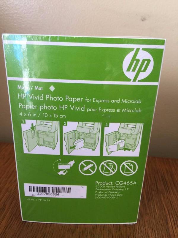 lot 196 image: Four packs of 180 sheets of HP photo paper 4x...