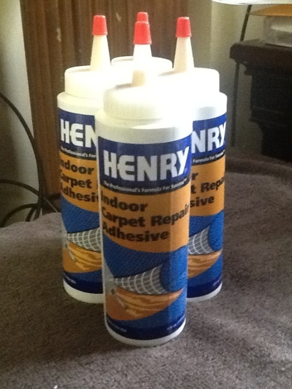 lot 7515 image: 4 bottles of carpet  repair adhesive