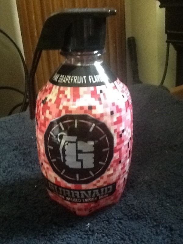 lot 7549 image: Two cases of 12 bottles of grenade energy drink