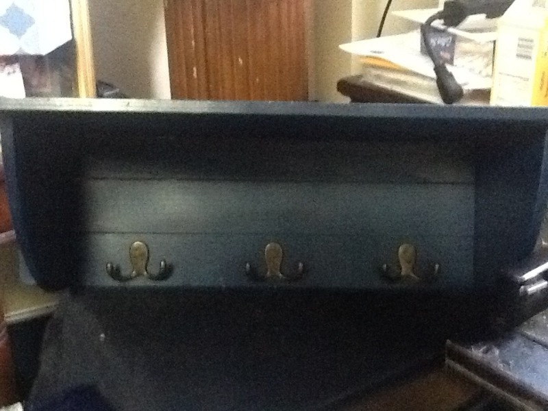 lot 7575 image: Nice 24 inch wooden wall shelf with hangers