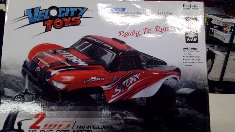 lot 5544 image: Velocity 2 WD Red RC Car