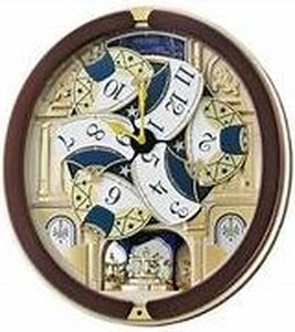 lot 2041 image: Seiko Brand 17 Melodies in Motion Moving Wall Clock With Songs&nbsp(stock photo approximate - model unknown - see pics)