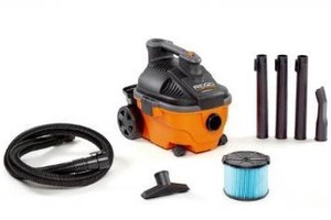 lot 6868 image: RIDGID 4 Gallon 5.0 Peak HP Portable WetDry Shop Vacuum with Fine Dust Filter, Locking Hose and Accessories, OrangesPeaches