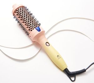 lot 2487 image: Calista FAUXblo Heated Airless Blowout Brush, 1.25, BLUE in Color, NEW
