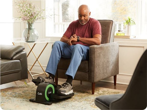 lot 2679 image: Cubii JR2 Compact Seated Elliptical with Mat and Footstraps (Retails $259)