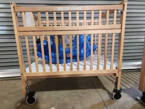 lot 4277 image: Whitney Evacuation Crib and Little Tikes Rocking Dog
