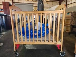 lot 4259 image: Foundations, Evacuation Crib and Rocking Puppy