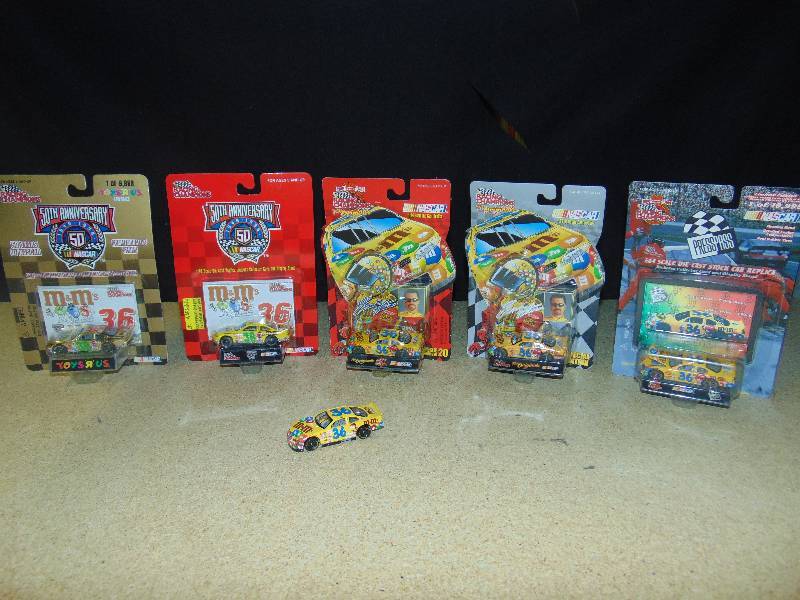lot 4008 image: (6) ct. lot M&Ms Racing Nascar #18 Kyle Bush Die-cast cars (hot-wheels size) Winners Circle, muscle Machine & Other brands