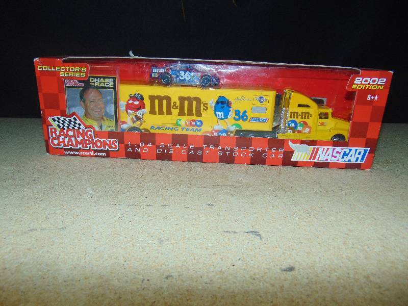 lot 4020 image: Ken Schrader #36 M&Ms Racing Nascar 164 scale Transporter and die cast car, Racing champions