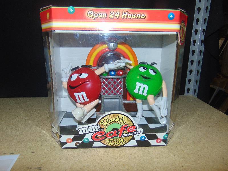 lot 4055 image: Dancing to the Oldies M&M Rock-n-Roll Candy Dispenser, in original box