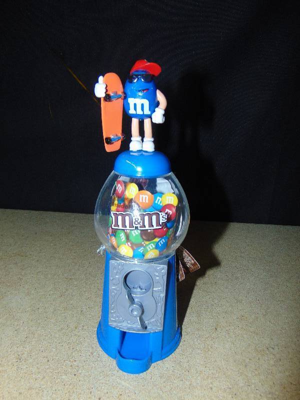 lot 4085 image: M&Ms Candy Dispenser, Blue Skateboarder, 9 tall