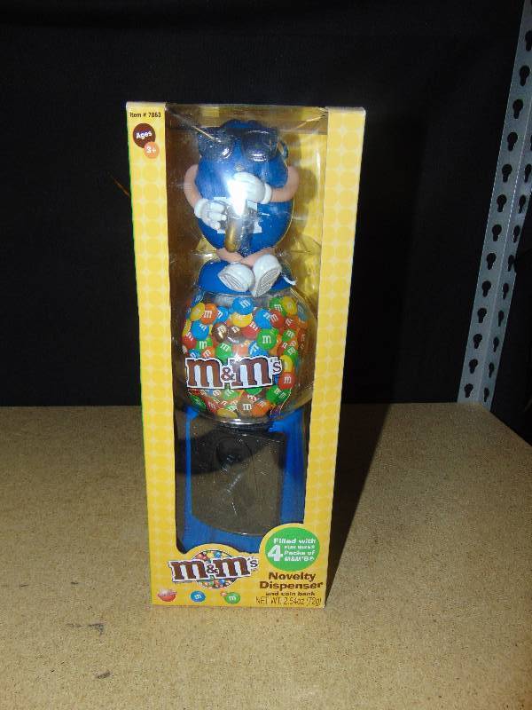 lot 4088 image: M&Ms Novelty Dispenser, Blue w Gold Saxophone 13 tall