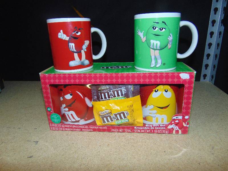 lot 4094 image: (4) ct. lot M&Ms mugs (2) packaged as a gift set, green & yellow, (2) open, red & Green