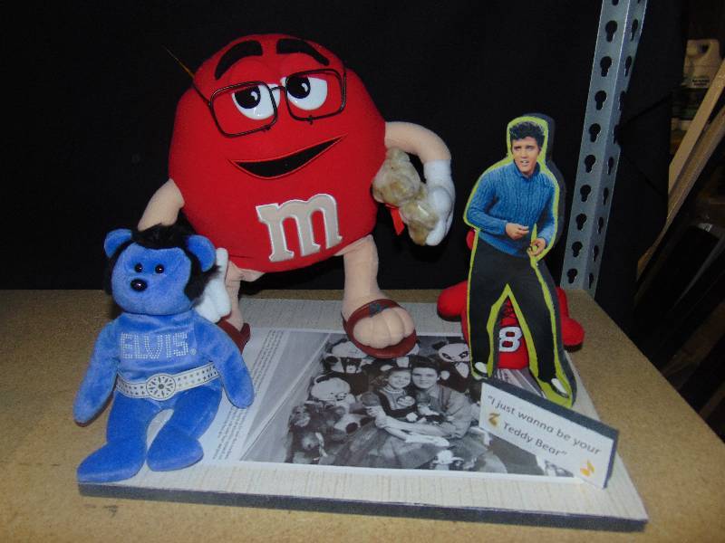 lot 4103 image: Elvis, M&Ms, Nascar Compilation Collectors piece from M&Ms Convention, Signed by Elvis Impersonator