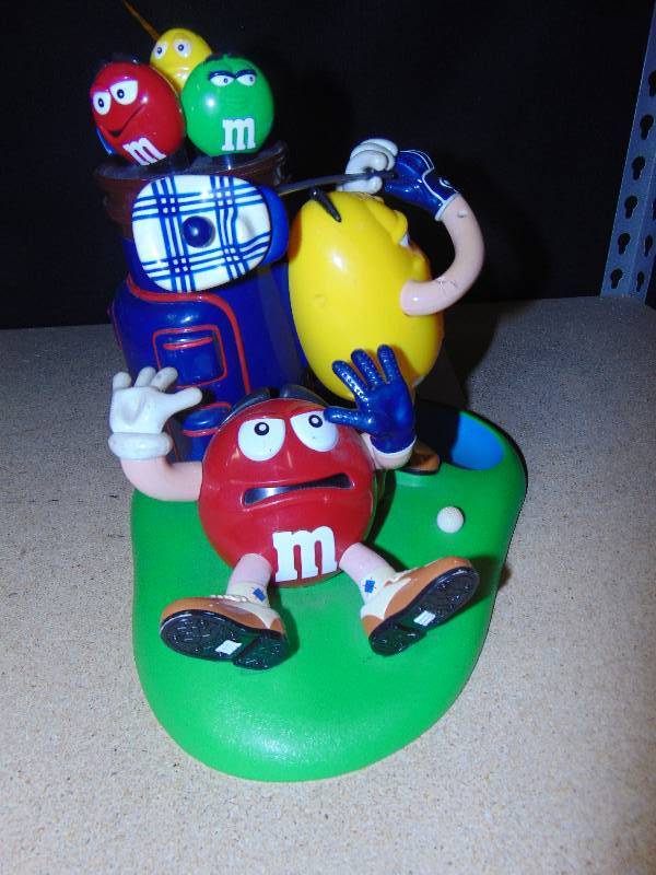 lot 4105 image: M&Ms golf Candy Dispenser, 9tall, blue bag