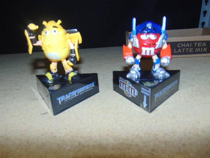 lot 4108 image: (2) ct. lot M&Ms Transformers ornaments