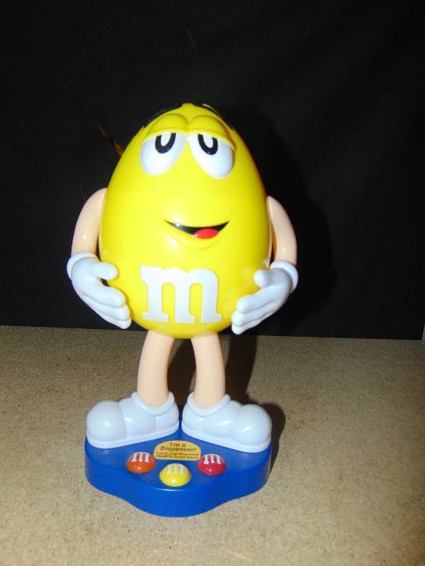lot 4114 image: Yellow M&Ms Candy Dispenser 2012, 10tall
