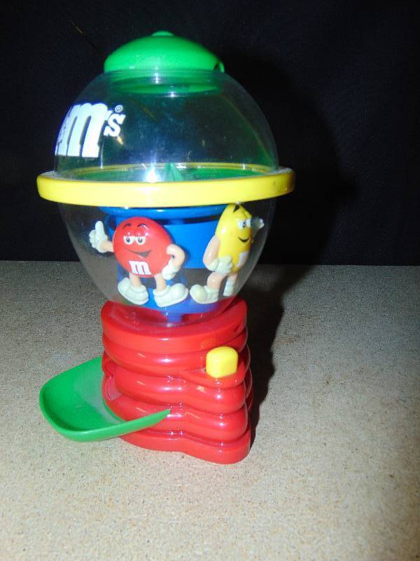 lot 4117 image: M&Ms Candy Dispenser, Red & Yellow, 9 tall