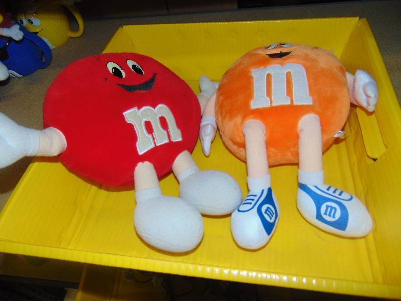 lot 4123 image: (2) ct. lot M&Ms Plush Toys, Red & Orange, approx 11 tall