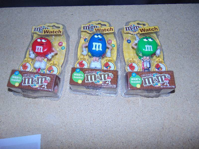 lot 4144 image: (3) ct. lot M&Ms Watches, Red, Green and Blue