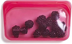 lot 43000119 image: Stasher Silicone Reusable Storage Bag, Snack (Raspberry)  Food Meal Prep Storage Container  Lunch, Travel, Makeup, Gym Bag  Freezer, Oven, Microwave, Dishwasher Safe, Leakproof