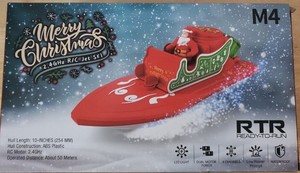lot 1969 image: Christmas 2.4Ghz RC Jet Ski