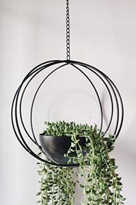 lot 1177 image: RISEON Boho Black Metal Plant Hanger,Metal Geometric Hanging Planter, Modern Planter, Mid Century Air Plant Holder Stand, Minimalist Planter for Indoor Outdoor Home Wedding Decor Retail $31.42