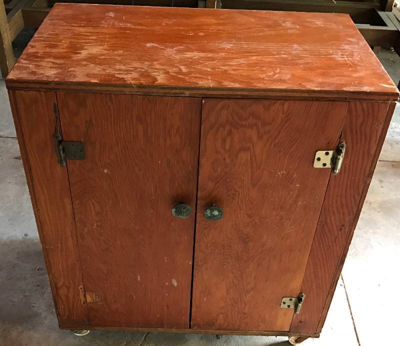lot 2286 image: Rolling Wooden Cabinet with Two Shelves and All Contents