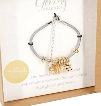 lot 400089 image: Demdaco Christmas Snowflake Giving Bracelet