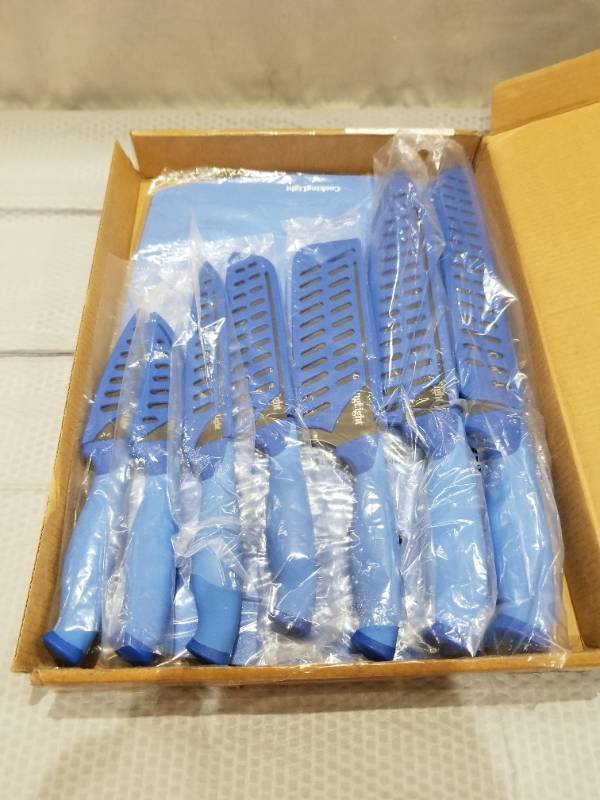 lot 400102 image: Retail - $36.25 Cooking Light 7-Piece Cutlery Set w Sheaths