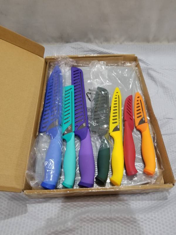 lot 400103 image: Retail - $36.25 Cooking Light 7-Piece Cutlery Set w Sheaths
