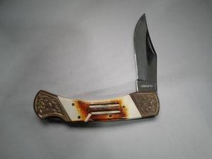 lot 23045 image: Locking Blade Pocket Knife