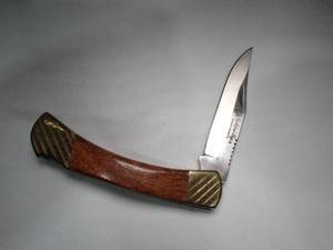 lot 23046 image: Locking Blade Pocket Knife  Golden Tiger