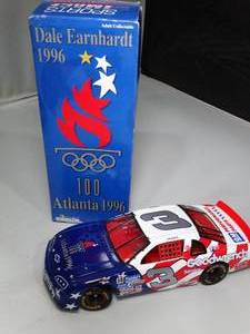 lot 23099 image: 1996  124 Scale Diecast Dale Earnhardt  100 yr of Atlanta Olympics  Red White and Blue Car in Box