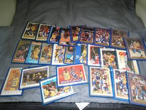 lot 23334 image: Early 90s Lot of 25 Magic Johnson NBA Basketball Trader Cards