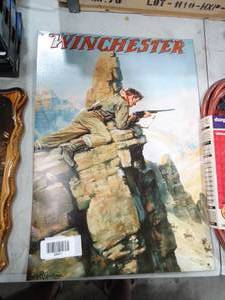 lot 23411 image: Metal Winchester Reproduction wall sign