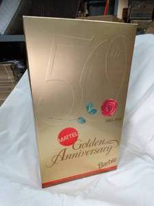 lot 23513 image: 1995  50th Golden Anniversary  Barbie  Opened to photograph