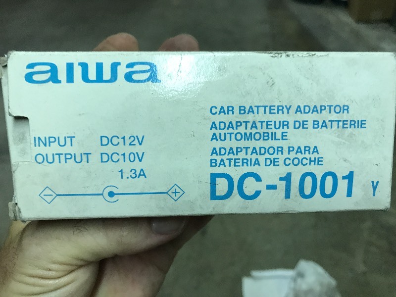 lot 1011 image: AIWA SC-1001 Car Battery Adapter