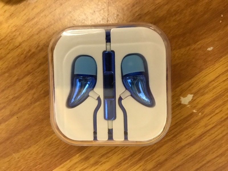 lot 1038 image: Compact, stylish ear buds.