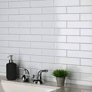 lot 2779 image: Glossy White Tile Pieces, 7.75x2.5 Each, 38 Pieces