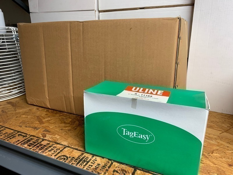 lot 196 image: 1 New Case of 50,000 ULINE S-11165 5 Natural Security Tag Loops (10 Box w 5,000 Each)
