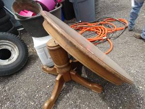 lot 24662 image: Nice Round Wooden Table.