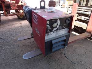 lot 23646 image: Lincoln electric Weldanpower 150 welder
