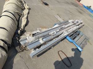 lot 23555 image: Lot of 9 aluminum L stock 144 long