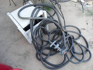 lot 23578 image: Garden hose & hose reel box