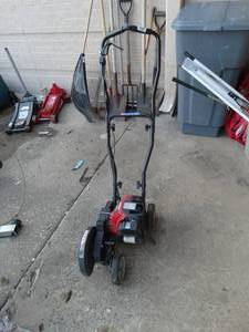 lot 23593 image: Craftsman gas powered edger- Like New
