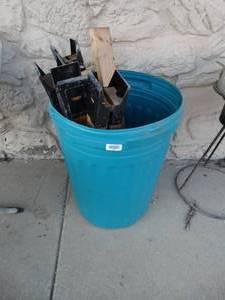 lot 23605 image: Trash can w saw horses